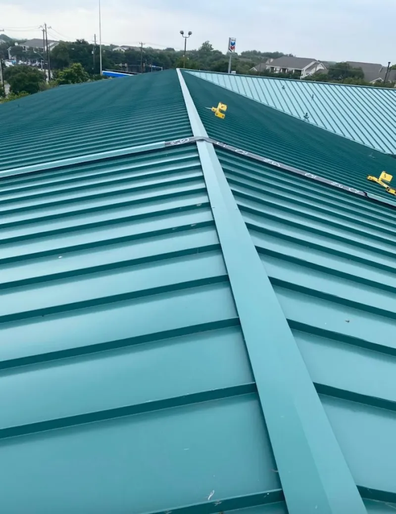 Green commercial metal roof ridge and valley for Metal Roof Repair in Senatobia
